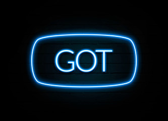 Got  - colorful Neon Sign on brickwall