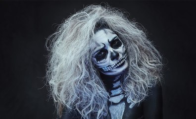 Halloween female skull makeup.