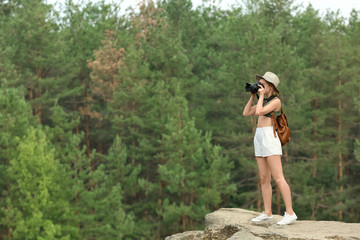 Young beautiful woman spending time outdoors