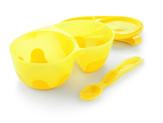 Bright baby tableware on white background