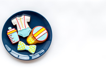 baby shower with cookies for celebration on white background top view mock up