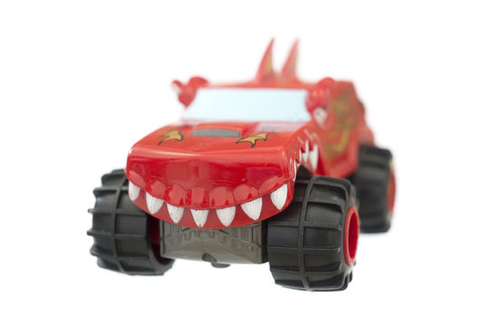 Monster truck , toy car on white background .