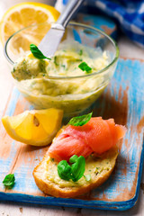 Butter with a basil and a lemon for sandwiches