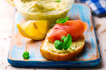 Butter with a basil and a lemon for sandwiches