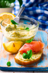 Butter with a basil and a lemon for sandwiches