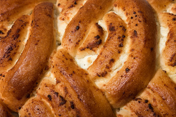 Fresh ruddy freshly cooked pie lies on the towel