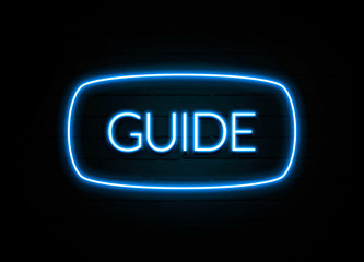 Guide  - colorful Neon Sign on brickwall