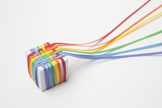 Woven rainbow paper covered cube