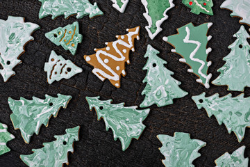 christmas tree cookies on a wooden background