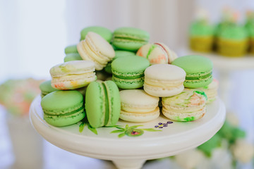 Close up of dessert table with a large macaroons composition