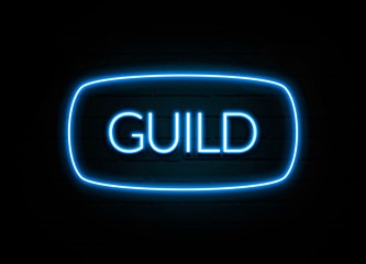 Guild  - colorful Neon Sign on brickwall