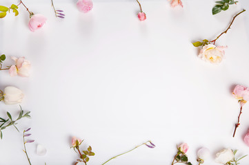 Festive flower English rose composition on the white background. Overhead view. Copy space. Birthday, Mother's, Valentines, Women's, Wedding Day concept.