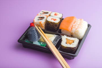 Eating set of sushi.