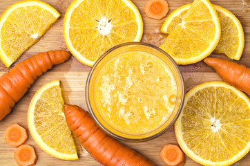 Carrot and orange juice. Vegetable and fruit juice. Top view. 