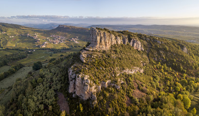 Aerial view of Solutre rock in Burgundy at sunrise, France - obrazy, fototapety, plakaty