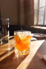 Cocktail in the sunlight on a table