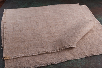 canvas fabric with folds in dark tones
