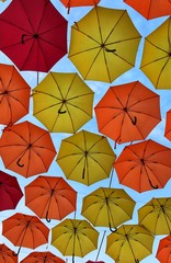 Fototapeta na wymiar Flying happy umbrellas