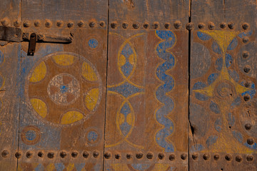 painted decorated old wooden arab door closeup