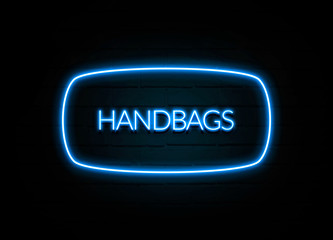 Handbags  - colorful Neon Sign on brickwall