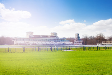 Chantilly racecourse with stands at sunny day - obrazy, fototapety, plakaty