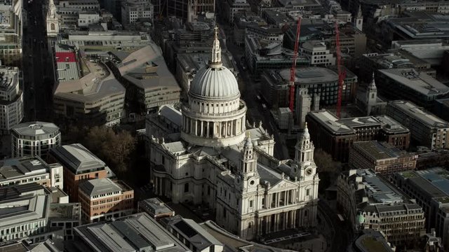  Aerial flight above St Paul's Cathedral London & tourists standing on viewing platform above the famous dome