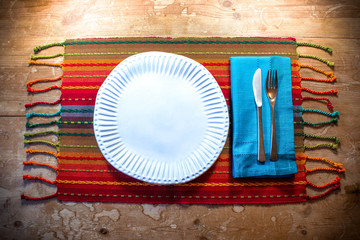 American Southwest inspired dinner place setting ideal for fall in rich colors
