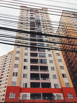 Retro Apartment Block with Lots of Telephone Wires