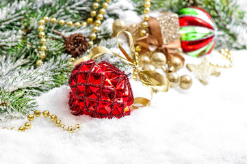 Christmas tree branches red bauble golden decoration