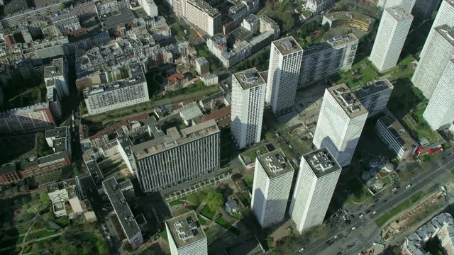 Aerial view above tower blocks and roads in a district of Paris