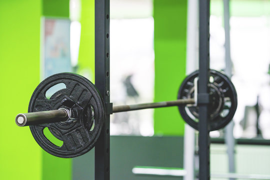 The Barbell With A Plates In The Sport Club