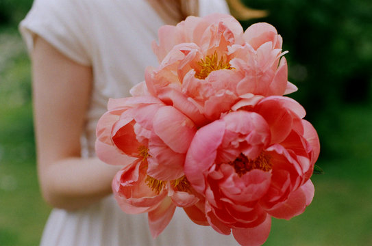 Girl With A Peony Bouquet