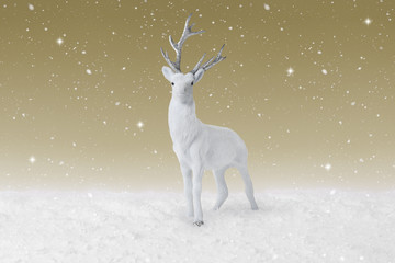 Snow falling on a White Christmas Reindeer