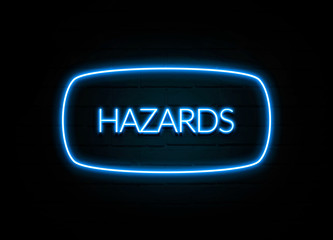 Hazards  - colorful Neon Sign on brickwall
