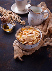 Corn flake, milk and honey.
