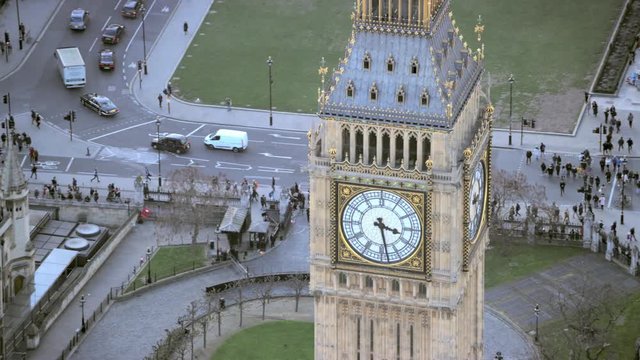  Aerial view above famous landmark Big Ben and Houses of Parliament in London's city of Westminster, situated by the side of the river Thames