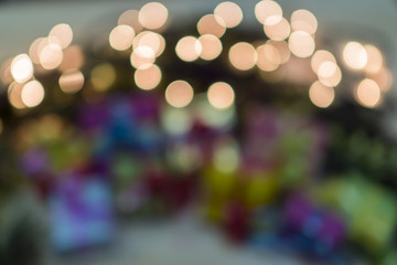 New Year abstraction with lights and a Christmas tree