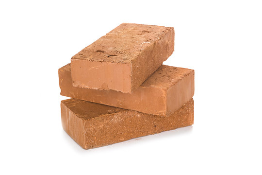 Fototapeta Solid clay bricks used for construction,Old red brick isolated on white background. Object isolated