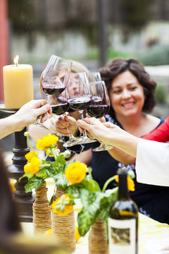 Dinner Party Cheers With Red Wine