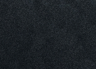 Metal door texture of black metal for the flat, the background of the doors is monochrome dark