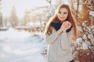 girl walking in a winter city