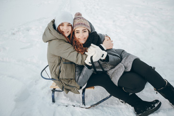 Fototapeta premium girl with sledge