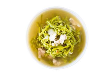 Northern Thai food (Kaeng Puk Plung),Ceylon spinach soup with pork in a bowl isolated on white background.Traditional and local food