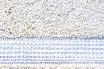 The texture of light yellow bath towel big pile