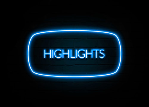 Highlights  - colorful Neon Sign on brickwall