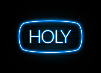 Holy  - colorful Neon Sign on brickwall