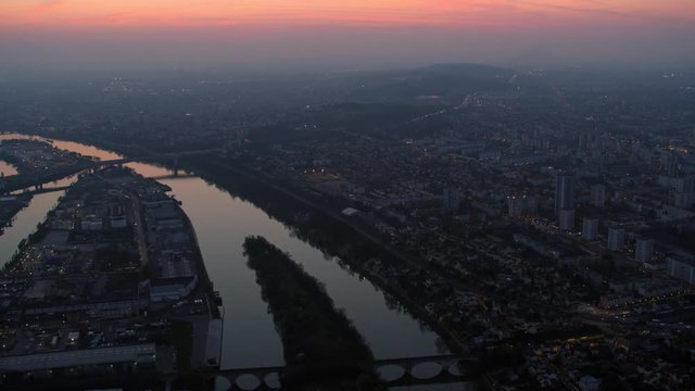 Aerial view of Paris cityscape, flying above the River Seine at sunrise
