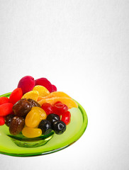 Dried fruits or assorted preserved fruits on background.