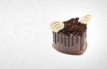 cake or love shaped chocolate cake on a background.