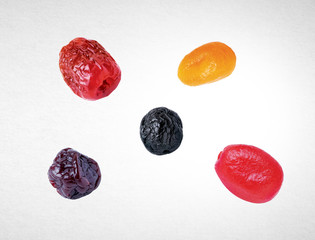 Naklejka premium Dried fruits or assorted preserved fruits on background.